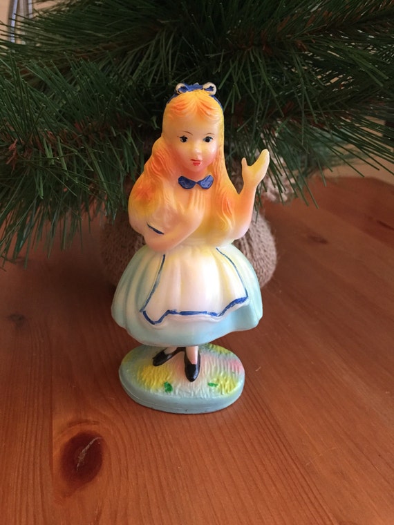 antique alice in wonderland figurines