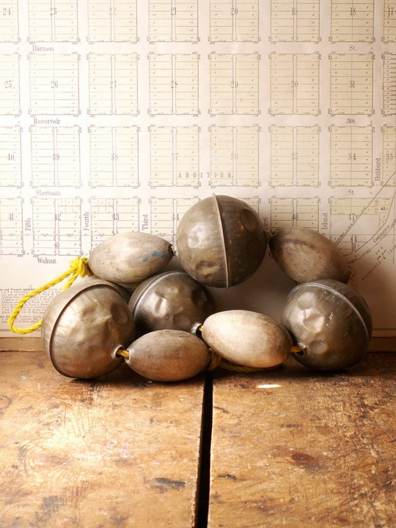 Vintage Copper and Wood Fishing Net Floats on a Rope