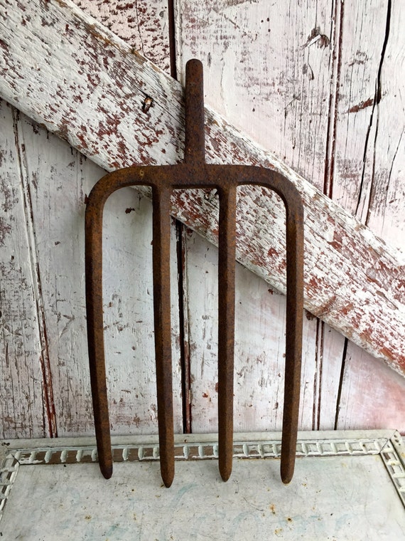 Vintage antique cast iron pitch fork for by LititzCarriageHouse