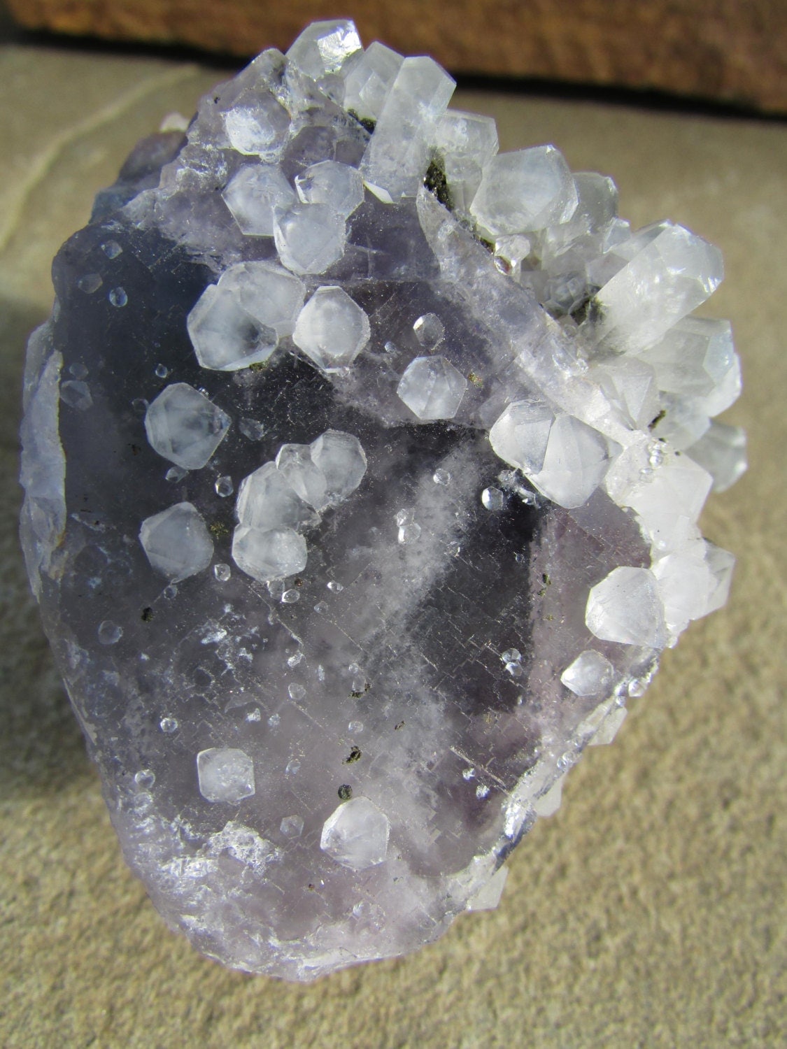 Large Fluorite Crystal with Quartz Crystals growing on the