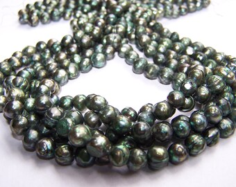 Faceted Green Freshwater Pearls 6-7mm 15.5 inch strand