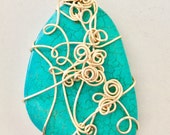 Large wrapped Turquoise stone pendant necklace.  