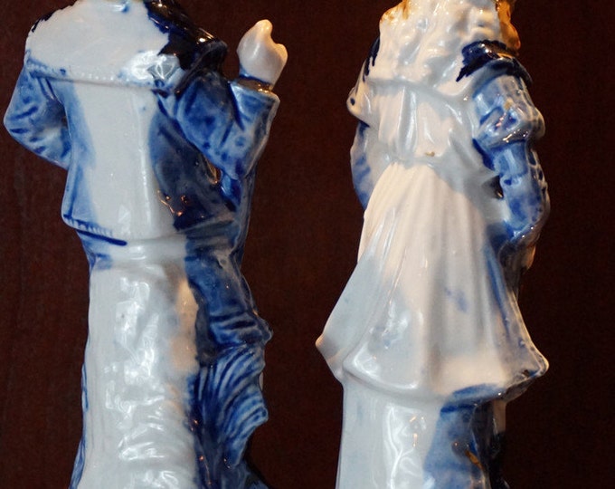 Porcelain Oarsmen Figurines