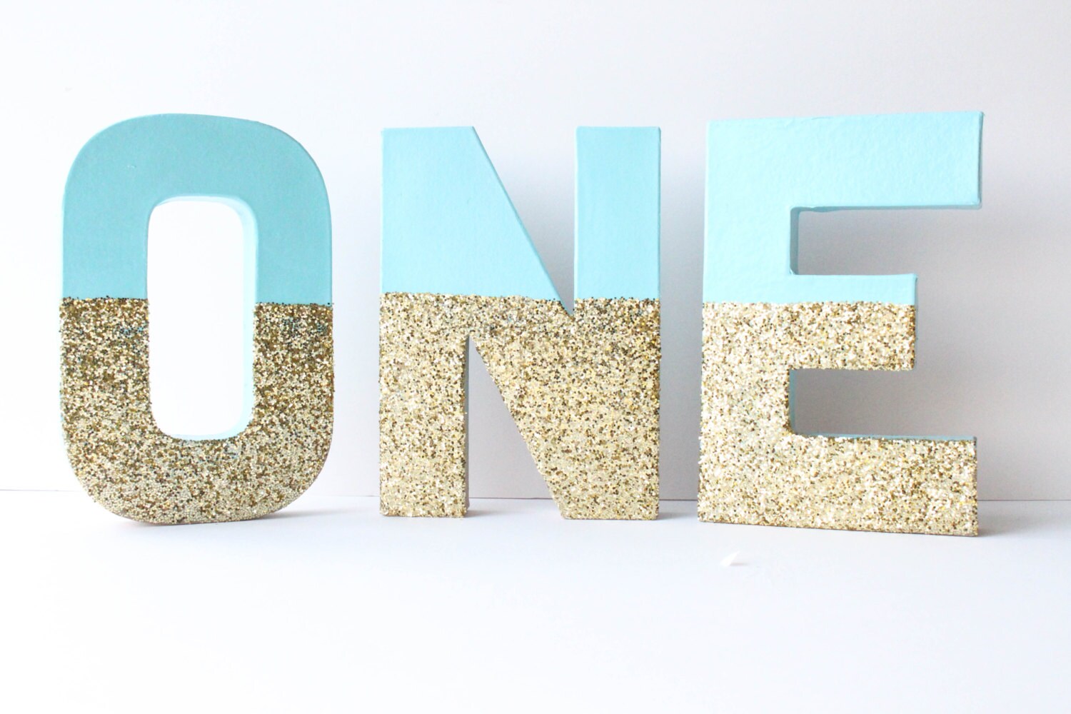 1 gold and blue glitter letters one 1st birthday birthday