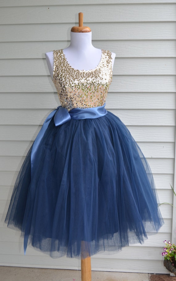 Navy tutu dress Snowflake Tutu Dress is rated out of 5 by 9. Rated 5 out of 5 by Yessy09 from Beautiful dress I don’t normally buy dresses with tutu, but decided to give it a try, it looks beautiful and my daughter loves it.