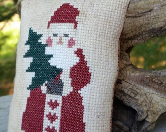 Old Fashioned Santa Holding a Tree Completed Cross Stitch Christmas Ornament
