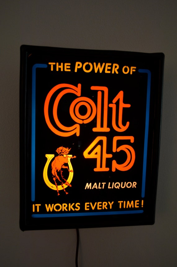 Vintage COLT 45 Malt Liquor lighted beer sign by ilovevintagestuff