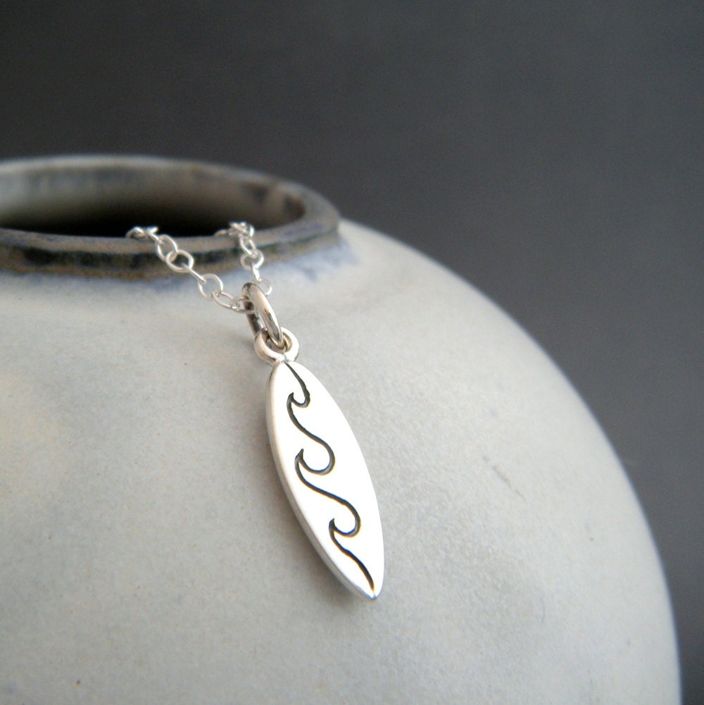 tiny surfboard necklace. small sterling silver charm. surfer