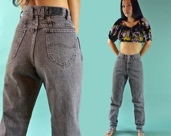 80s vintage high waisted jeans / Distressed by rockstreetvintage