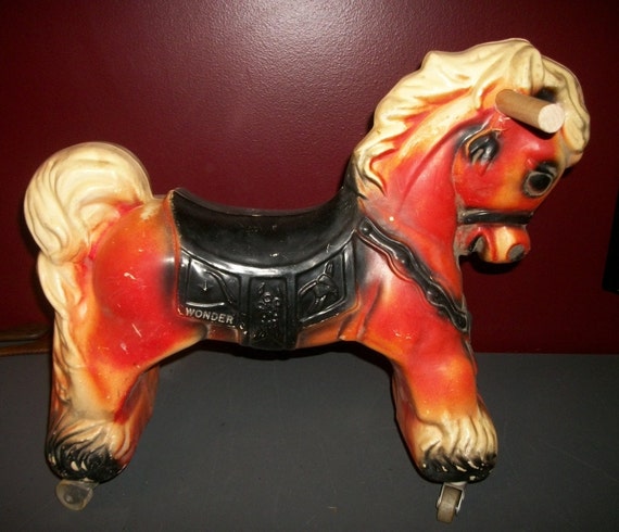 rolling riding horse toy