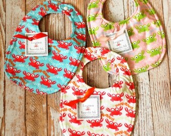 Louisiana Crab Reversible Cotton Bib in Blue, White or Pink