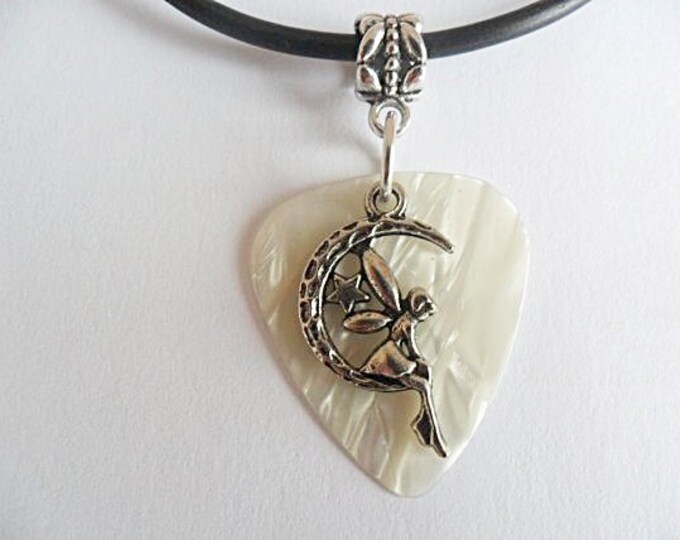 White Guitar pick necklace with moon fairy charm that is adjustable from 18" to 20"