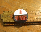 The Pretenders 1.25" Button Pinback Badge Pin Chrissie Hynde The Pretenders 1.25" Button Pinback Badge Pin Chrissie Hynde