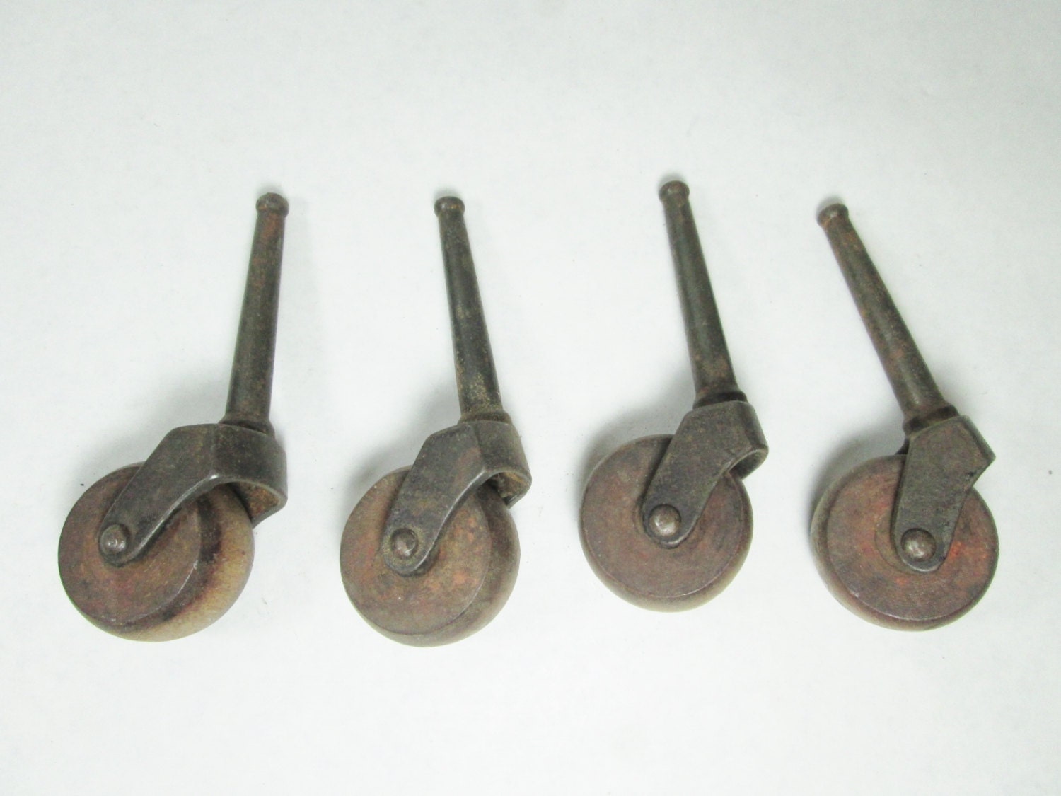 Four Antique Wood Iron Casters / Vintage Stem Casters for Furniture