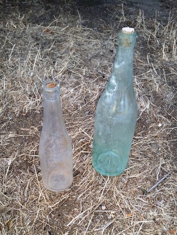 Items similar to Set of two old Glass Bottles 1920s Pluto Water and ...