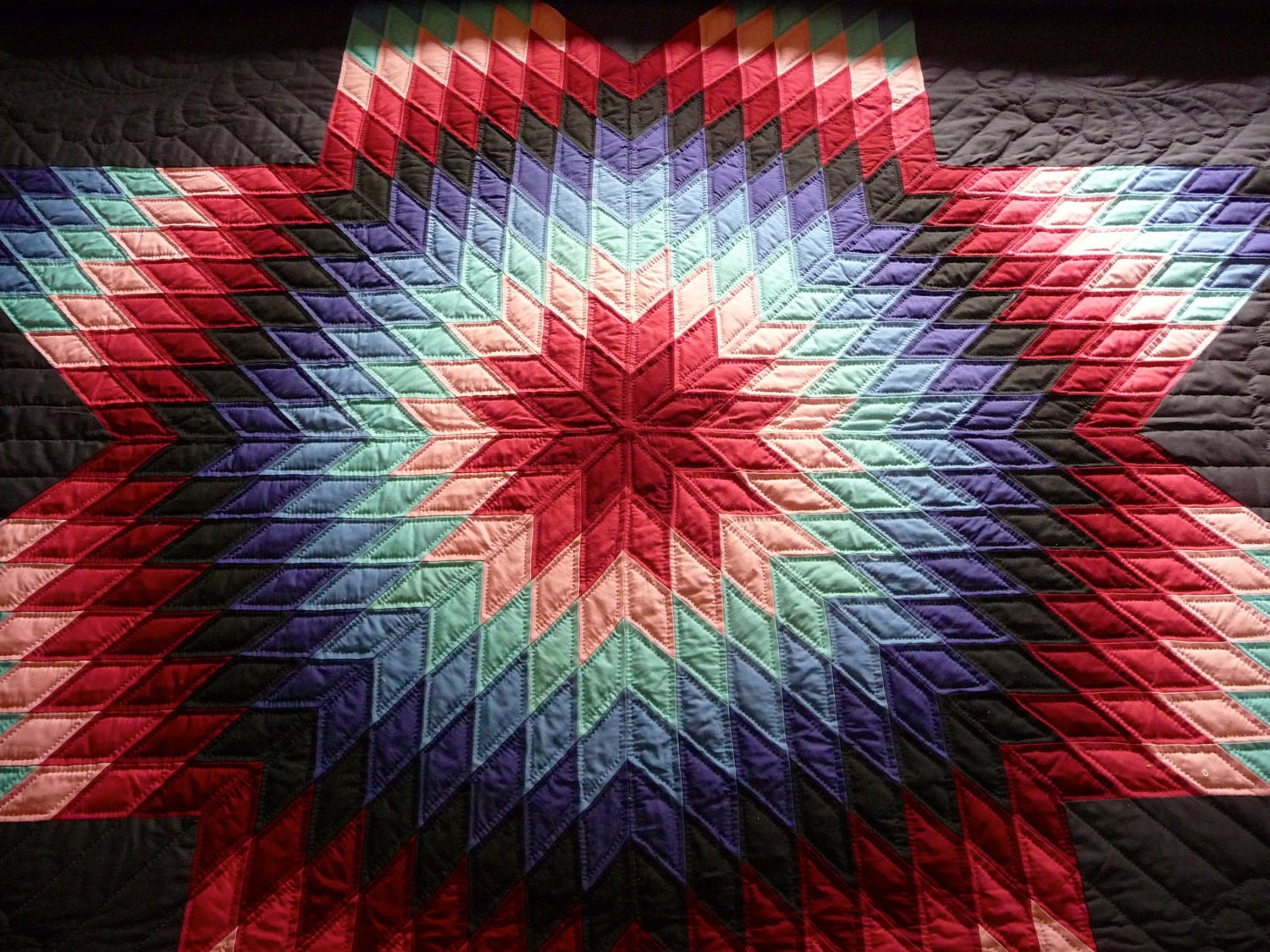 Amish Quilt Lone Star Pattern Over Black Background