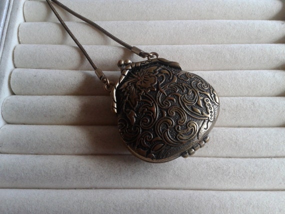 Items similar to Antique coin purse locket bronze necklace on Etsy