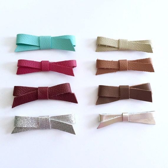Items similar to Leather Bow...Leather Bow Set on Etsy