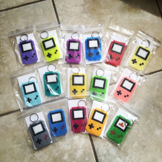 Mini gameboy keychains by CartridgeBlows on Etsy