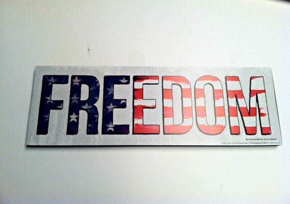 FREEDOM ISN'T FREE Print mounted on a wood sign board.