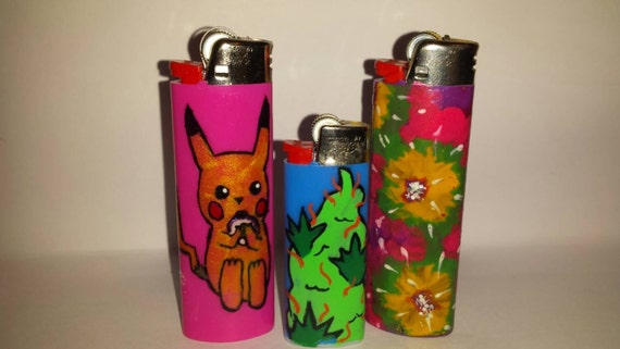 Hand painted lighters by danimal1223 on Etsy