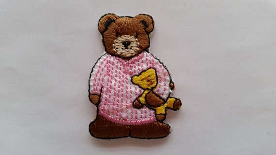 teddy bear wearing pyjamas