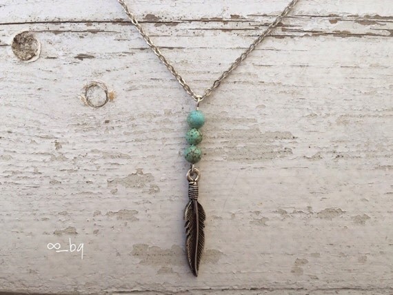 Tiny feather Necklace Tiny charm Necklace by KristinaKjewelry