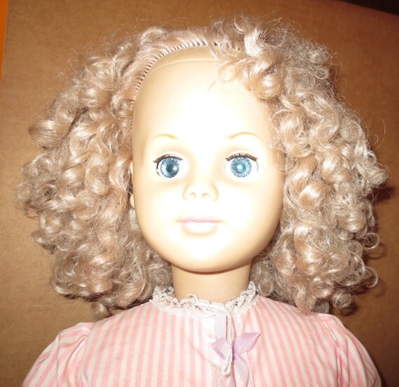 GREAT FIRST DOLL 30 inch Walker doll with blond currly hair