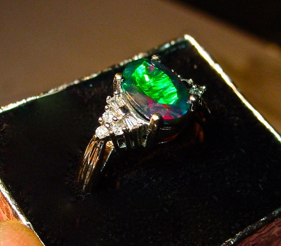 Black opal engagement rings