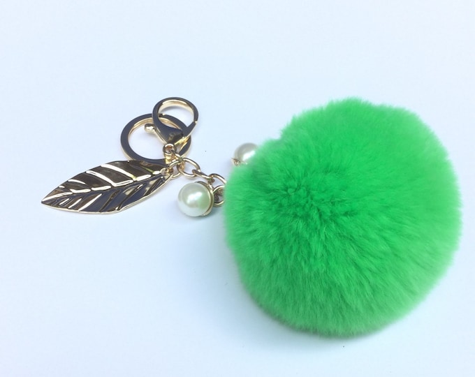 LIME pom pom keychain rex rabbit fur pompon unique bag charm in beautiful yellow color tone with leaf charm and pearls