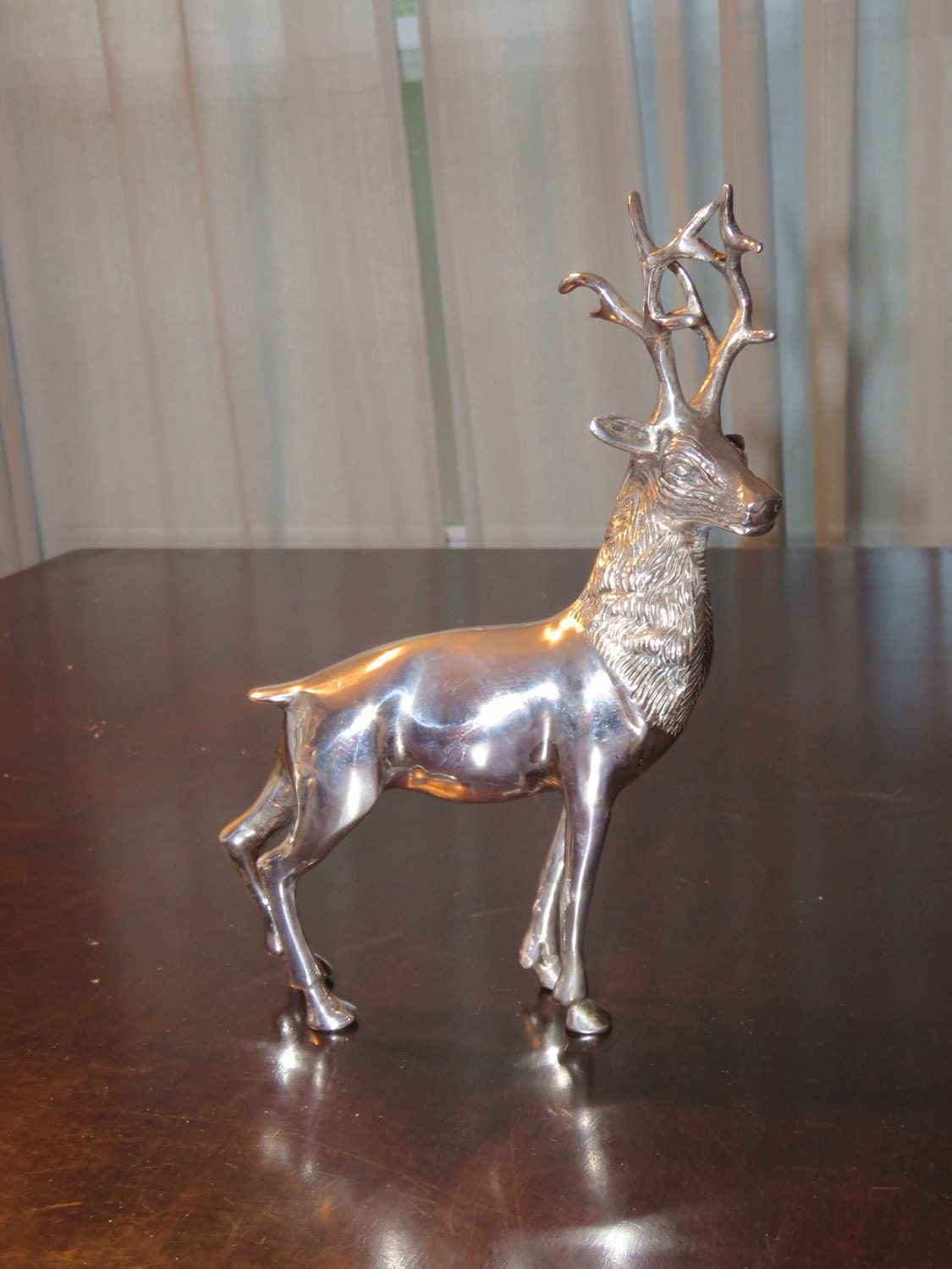 silver reindeer statue silver reindeer statue