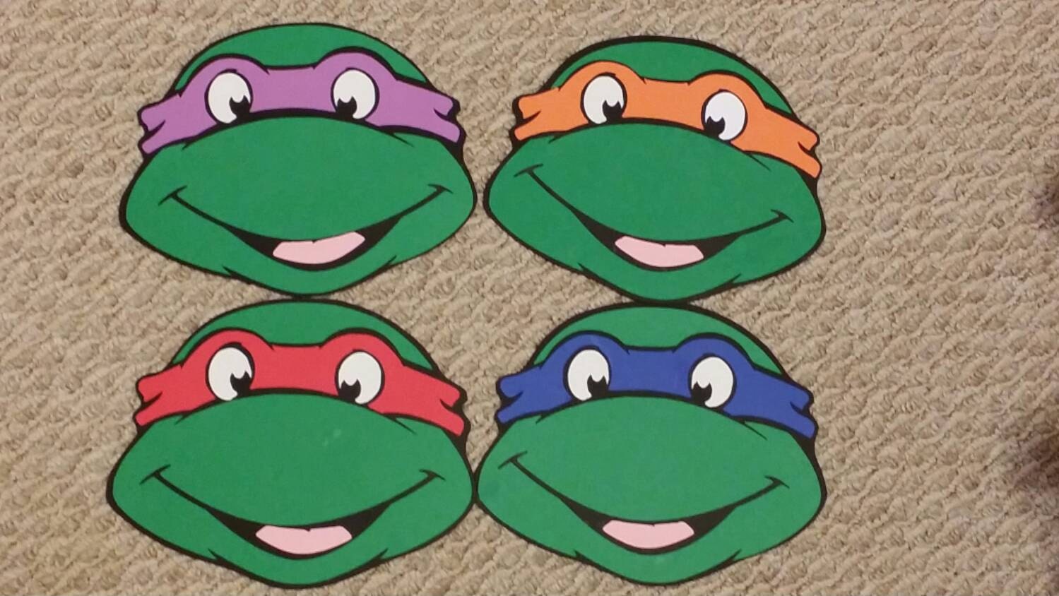 4 Teenage Mutant Ninja Turtle heads good for centerpieces