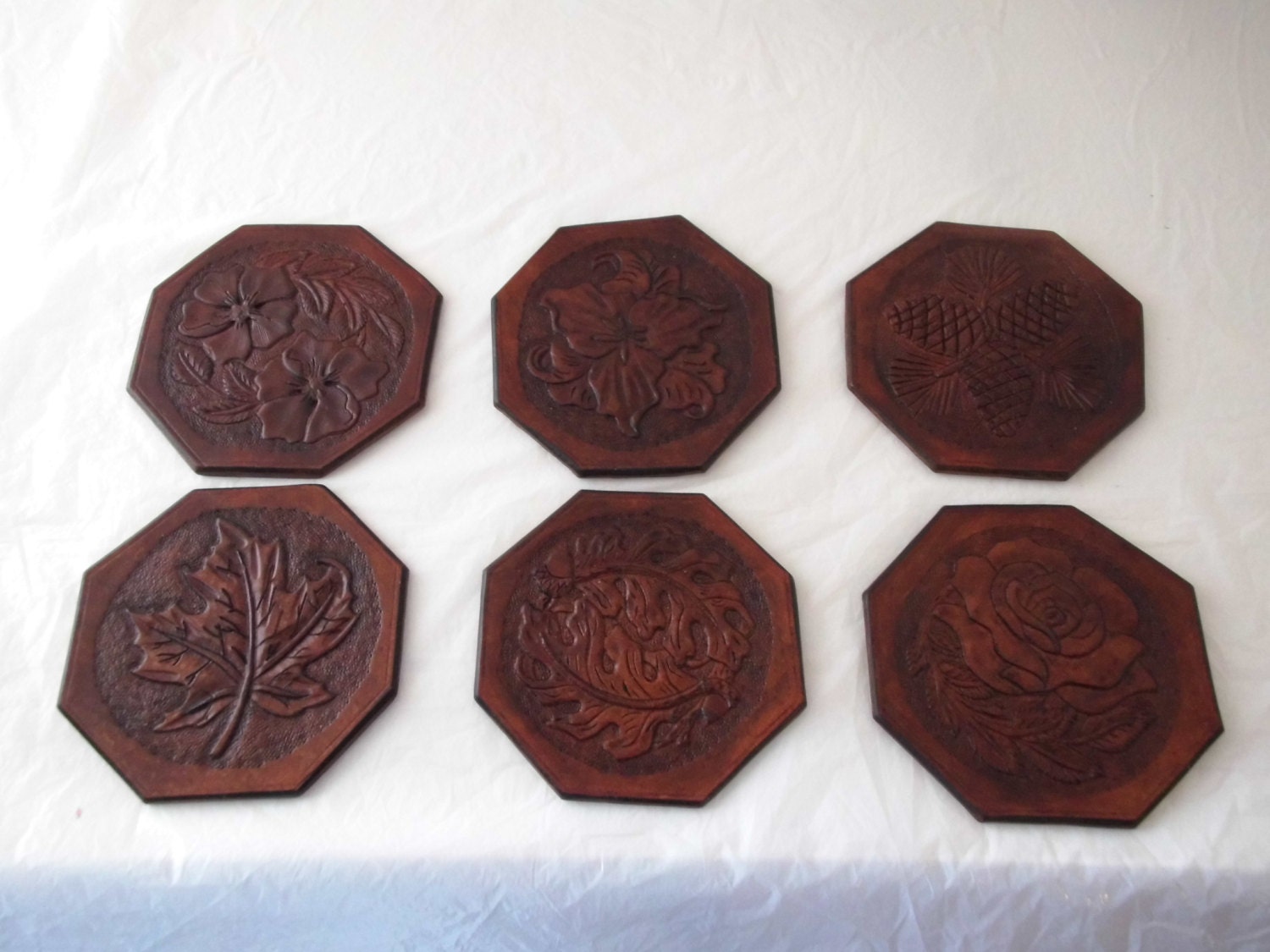 Set of 6 hand tooled leather coasters with or without a holder