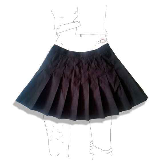 Black pleated tennis mini skirt