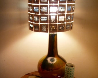 One of a kind custom slide lamp shade! Makes a great gift! I can transform your treasured memories from forgotten in the basement to