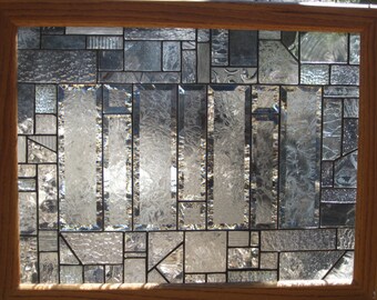 Stained glass window, framed in oak , glue chip bevels 21.25" t x 27.25" w