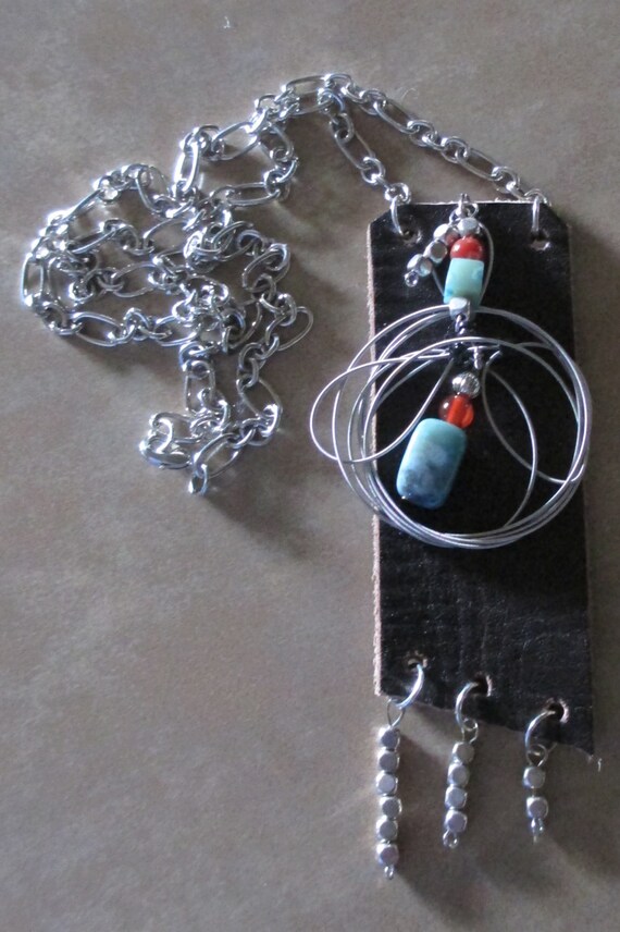 Items similar to Recycled Belt Using Guitar String & Beads Necklace on Etsy