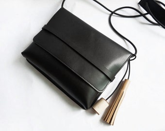 Simple Black Leather Crossbody bag with wood and leather tassel wholesale whole sale