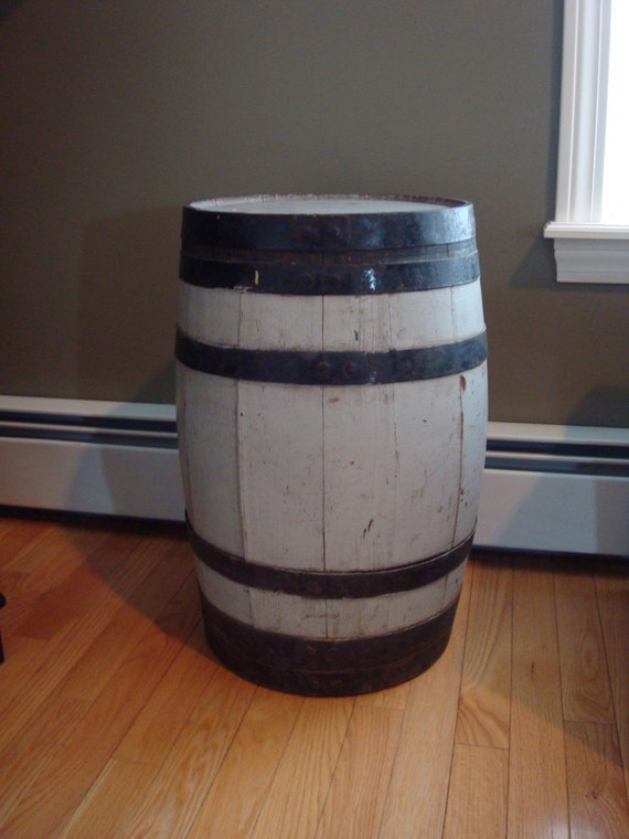 Old painted gray and black wine barrel