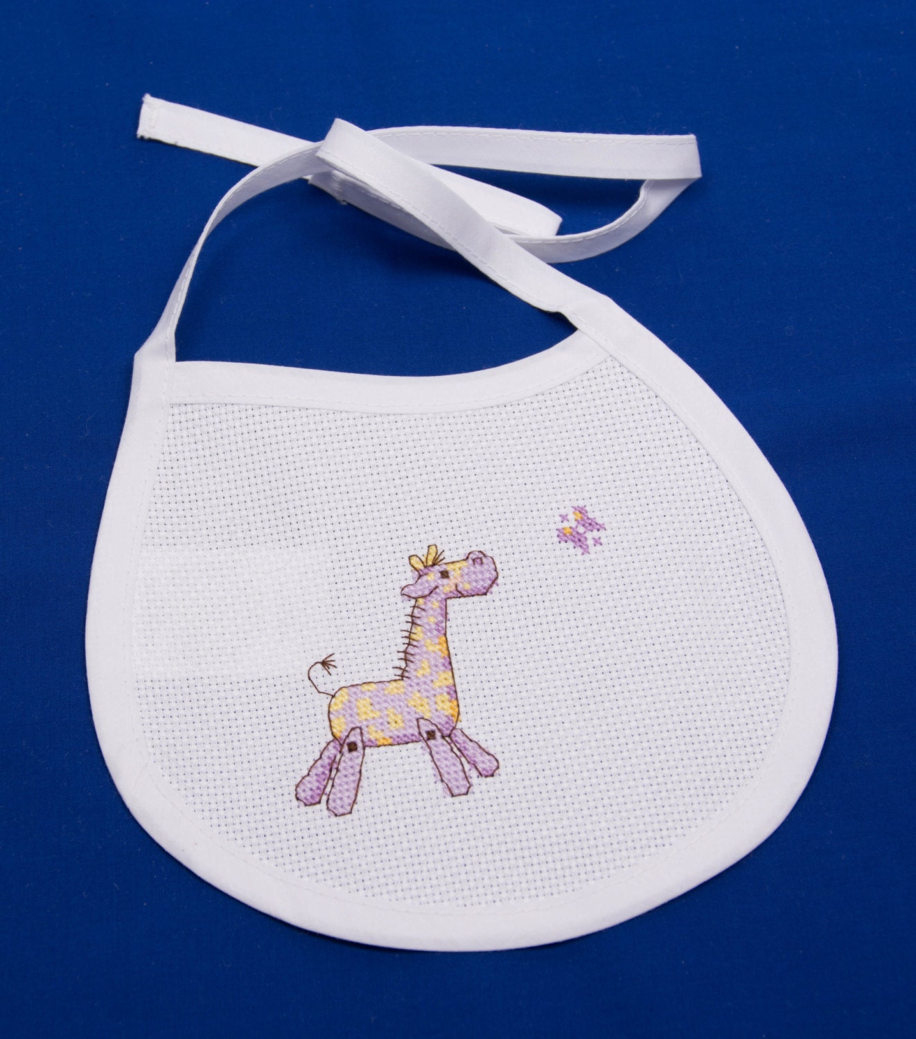 White Baby Bib with Hand Cross Stitch Purple and Yellow