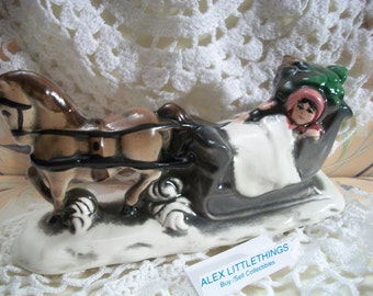 horse and sleigh figurine