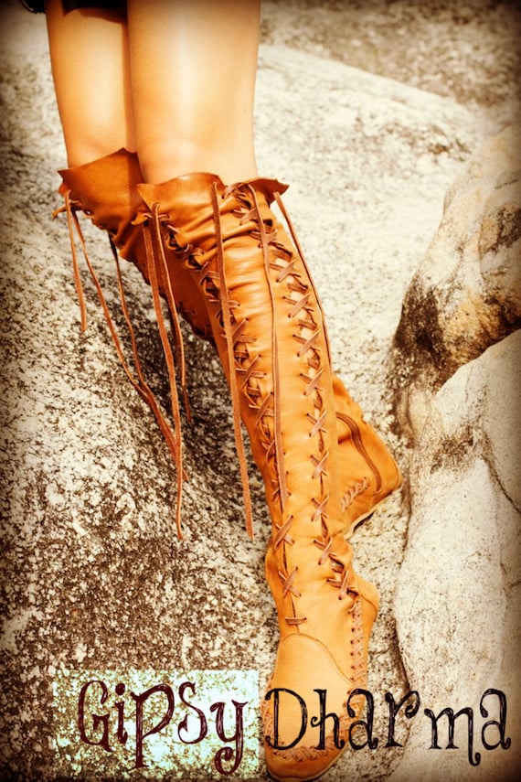 Handmade tan leather lace up boots for women.