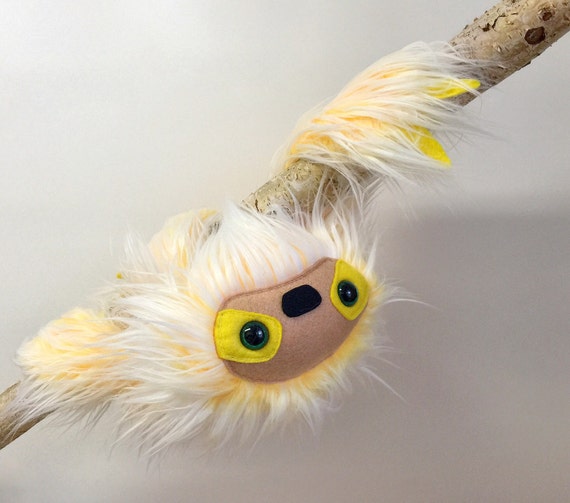 yellow sloth stuffed animal