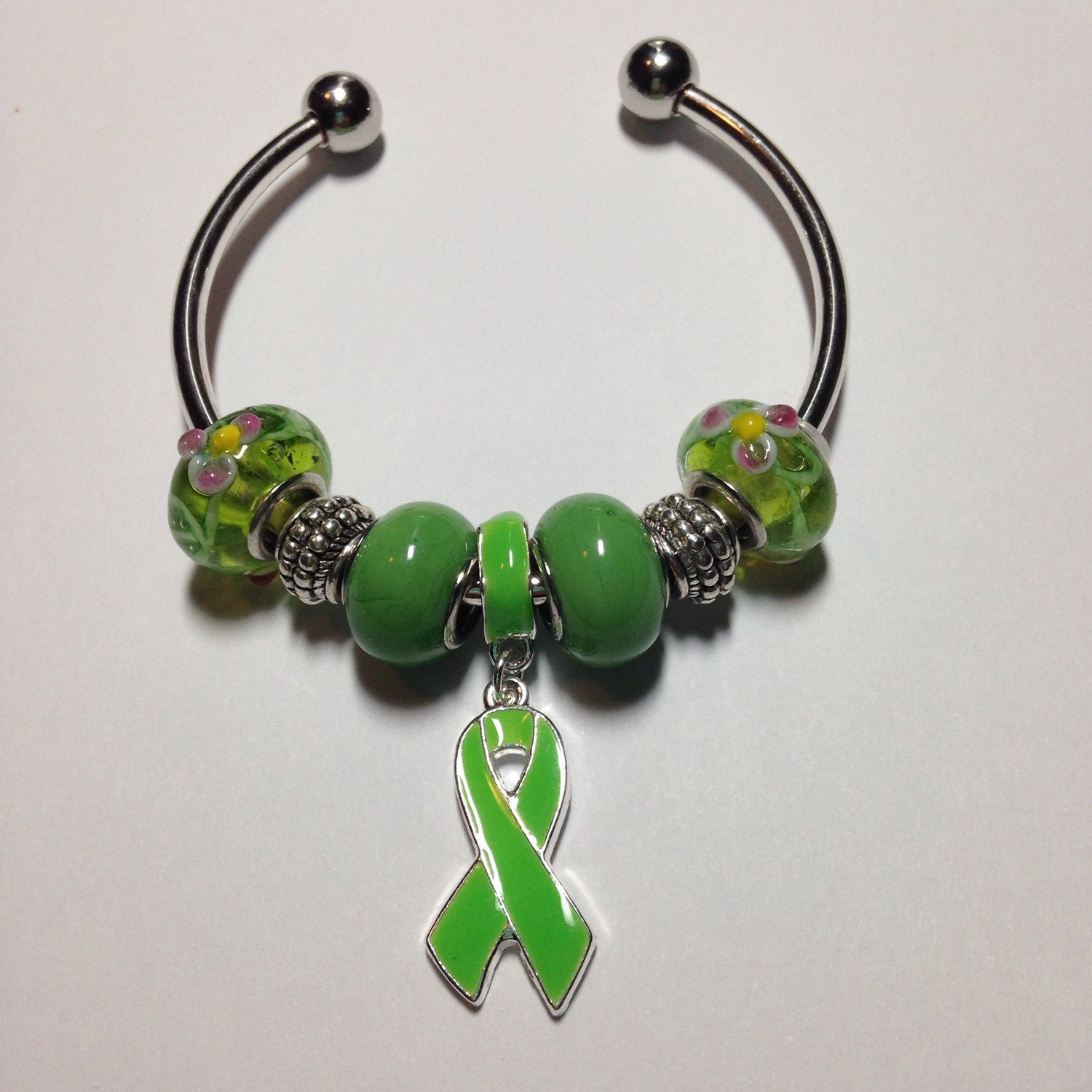Cerebral Palsy Awareness Bangle Bracelet Green Ribbon. From
