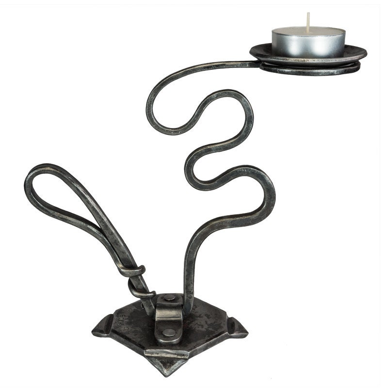 Candlestick / tea light holder out of wrought iron
