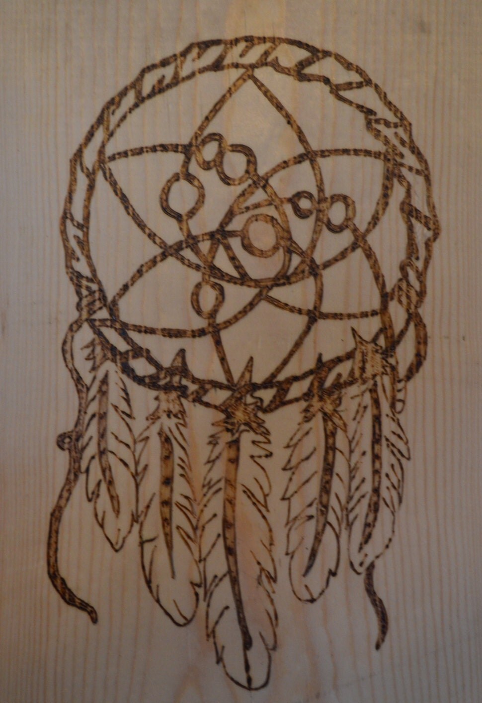 Wood Burning Indian dream catcher. Made in by aburningcreation