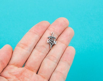 10 Silver Tone RN NURSE Charm Pendants chs0112