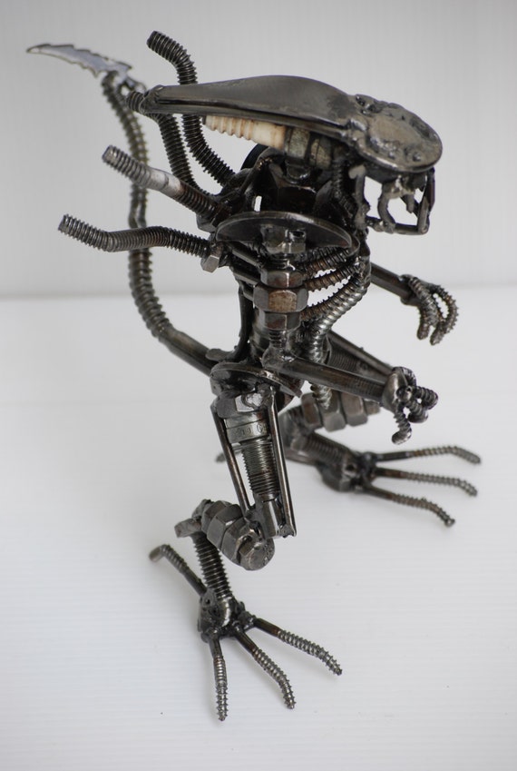 scrap metal alien figure