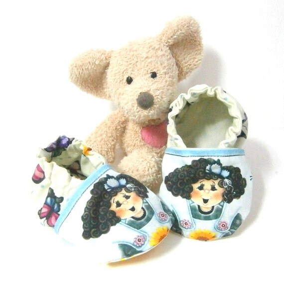 Items similar to Baby slippers made of cotton fabric with a little doll