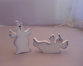 Halloween Ghost! Hand painted/wood decorations.This set of two chunky fun ghost are so cute. Kid friendly.